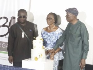 Mrs Monsurat Omotayo (middle) and Mr. Taiye Olaniyi (right) during the 30th anniversary celebration of Legacy