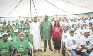 Mutfwang (middle), Dep. governor, Mrs Piyo (in red) and the Speaker of the Plateau State House of Assembly, Hon. Naanlong Daniel, with the students during the farewell ceremony.
