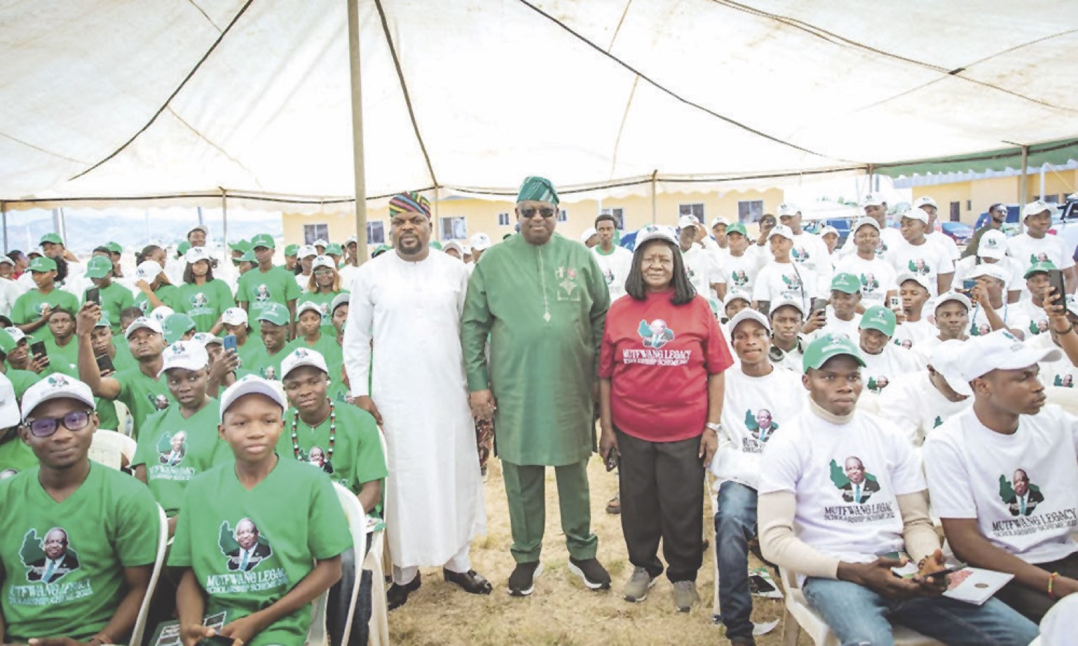 Mutfwang (middle), Dep. governor, Mrs Piyo (in red) and the Speaker of the Plateau State House of Assembly, Hon. Naanlong Daniel, with the students during the farewell ceremony.