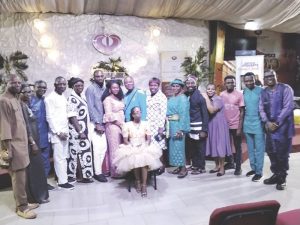 The author, Ifeoluwalose Ogunlana, in the middle