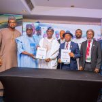 Benue State Governor Rev Fr Hyacinth Alia, the MD REA, Mr Abba Aliyu an other government officials after the MOU was signed