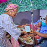 First Lady of Nigeria Oluremi Tinubu presenting the Birth Certificate to the parents of Baby Adakole born at midnight of Thursday 1st of January 2026 at the Federal medical Centre, Jabi