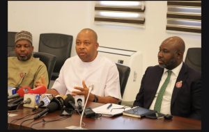 Director Lands Administration Chijioke Nkwabueze (m) flanked by the Mandate Secretary Education Dr Danlami Hayyu (L) and Chairman FCT IRS Michael Ango (R) during a Press briefing shortly after the FCT EXCO meeting on Wednesday, January 14, 2026
