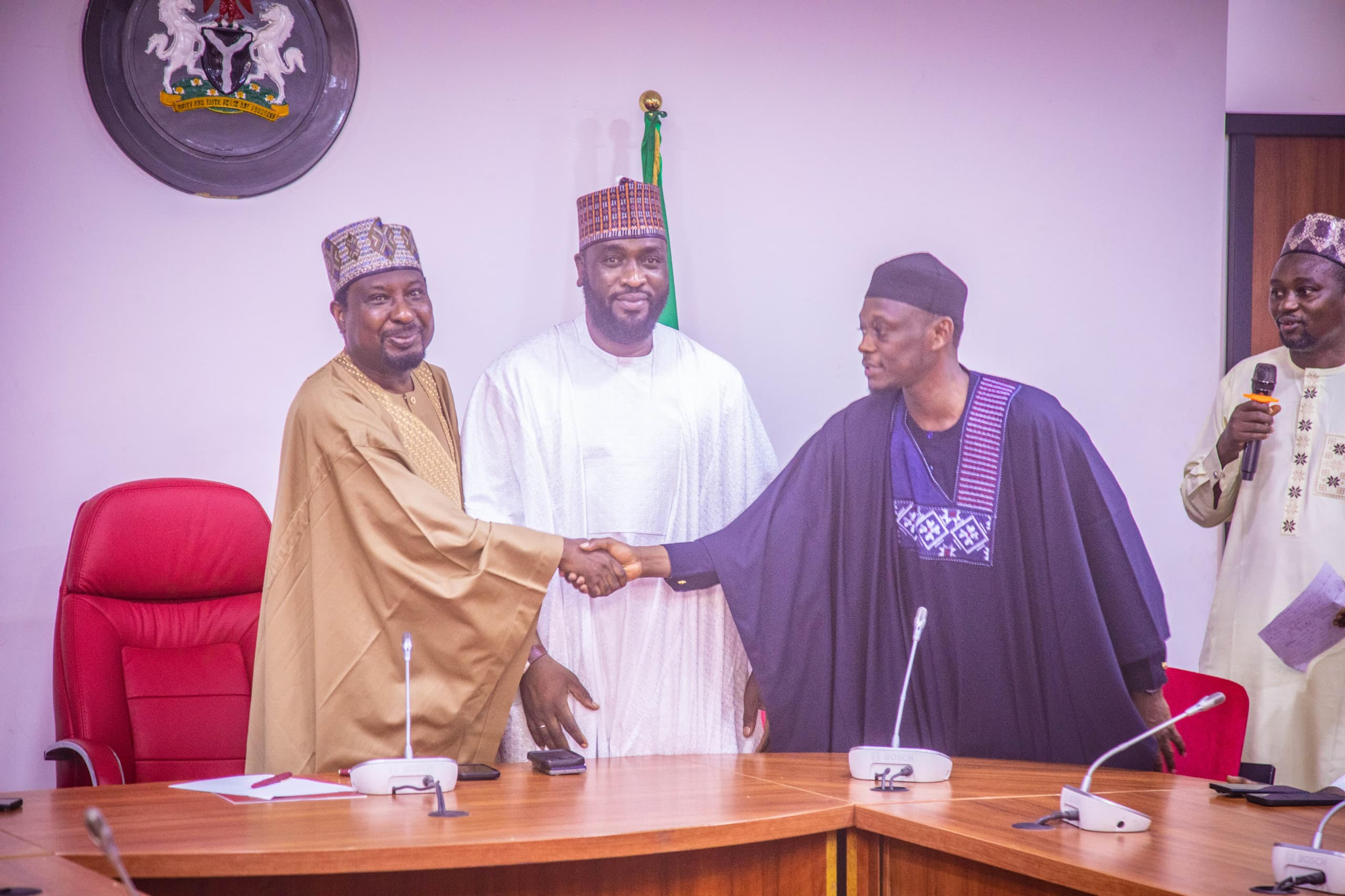 L-R: Deputy President of the Senate Senator Barau I Jibrin welcomes the son of former Vice President Atiku Abubakar, Abba, to the APC. With them is the North East Zonal Vice Chairman of the APC, Comrade Mustapha Salihu (Photo credit: DSP Media Office)