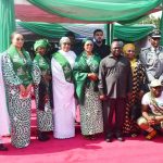 L-R: Minister of State for Health and Social Welfare, Dr. Izaq Salako; Wife of the Imo State Governor, Chioma Uzodimma; Wife of the Chief of Staff to the president, Mrs. Salamatu Gbajabiamila; Wife of the Vice President Hajia Nana Shettima; First Lady of Nigeria Oluremi Tinubu; Taraba State Governor Agbu Kefas; Wife of the Taraba State Governor Angyin Kefas Agbu; Comptroller-General of the Nigeria Custom service, Adewale Adeniyi, and Director General of NYSC, Brig.-Gen. Olakunle Nafiu, During the formal Presentation of Mobile Clinics to the National Youth Service Corps and Taraba State Government Under the Renewed Hope Initiative Health Support Programme (Love on Wheels), held in Abuja on Monday January 26, 2026.