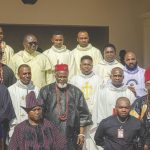 • Igwe Alison with Catholic Priests and freinds after the Holy Mass during the ceremony