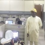 Dangut (left) with Mount Gilgal CBT official during monitoring of exam