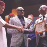 Dr Eric Opah Receiving The Entrepreneur Of The Year Award From Senator Orji Uzor Kalu And Dr Allen Onyema