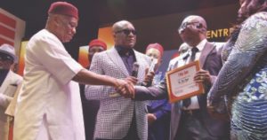 Dr Eric Opah Receiving The Entrepreneur Of The Year Award From Senator Orji Uzor Kalu And Dr Allen Onyema