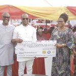 One of the beneficiaries, Ezenwuli with her cheque