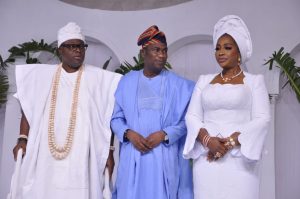 Deputy Governor of Lagos State, Femi Hamzat flanked by  Oniru of Iru Land, Victoria Island, Oba Omogbolahan Lawal, (Abisogun 11) and his wife, Olori Mariam Lawal  at the celebration of five years of Excellence held in his palace.
