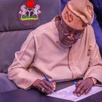 President Bola Tinubu signing the Electoral Act 2026 (Amendment) into law at the Presidential Villa, Abuja on Wednesday. Photo- X:@DOlusegun