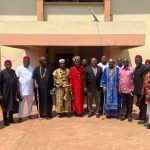 Prof Obetta in a group photo with the members of the host communities