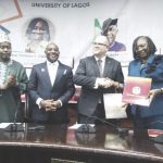 R-L- Ogunsola and William exchange MoU, while Alausa and Ribadu watch
