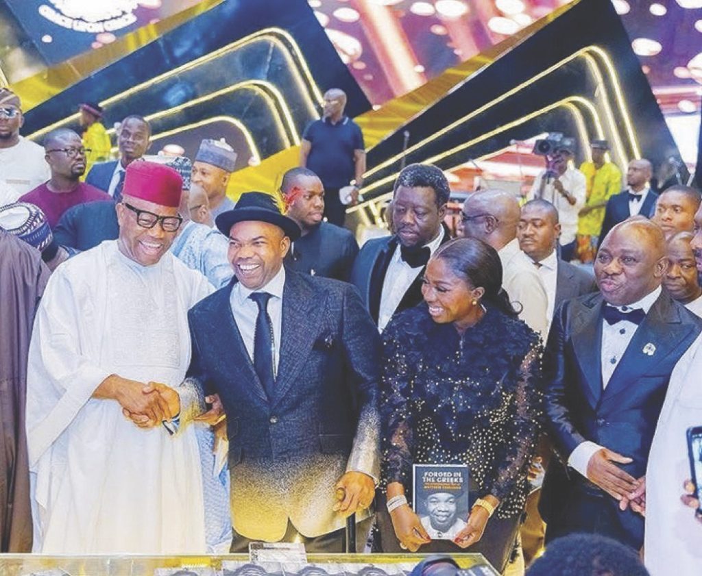 Senate President Godswill Akpabio with the celebrant, wife and guests