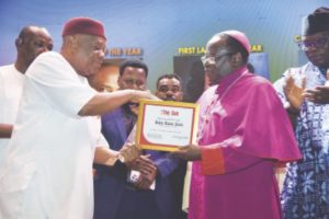 Senator Orji Uzor Kalu Presenting The Courage In Leadership Award To Bishop Matthew Kukah