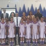 Students with officials of the NDIC at the workshop