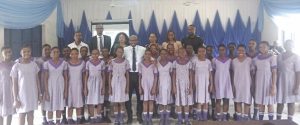 Students with officials of the NDIC at the workshop