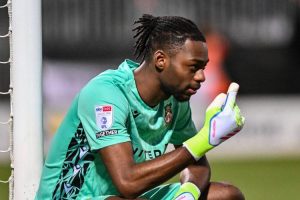 Wrexham goalkeeper Arthur Okonkwo.
