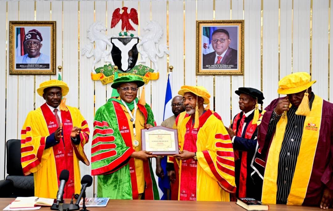 Governor of Cross River State, Bassey Otu, at his investiture as Patron of Nigerian Institute of Public Relations in Calabar by NIPR President, Ike Neliaku