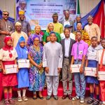 Honorable Commissioner of Basic and Secondary Education- MR. Jamiu Alli- Balogun, Permanent Secretary Ministry of Basic and Secondary Education -Abisola Dokunmu-Adegbite, CEO Roducate and Liv.ing MR. Femisola Awosika handing over Hope Edu Devices to public school students