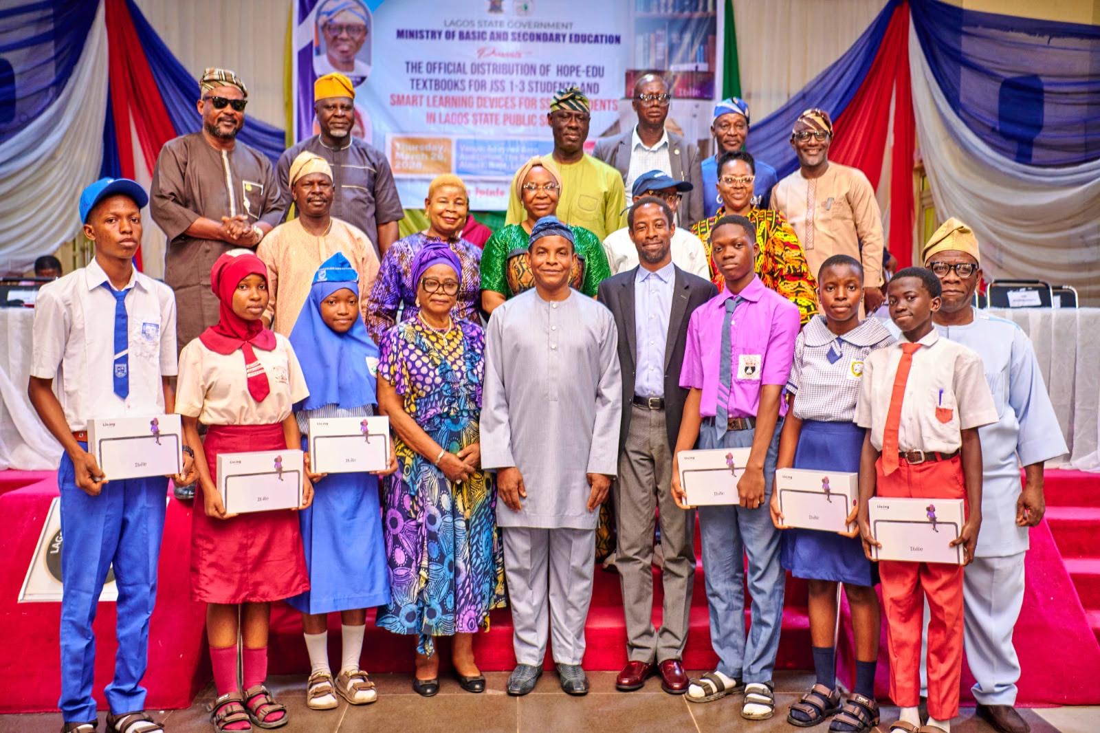 Honorable Commissioner of Basic and Secondary Education- MR. Jamiu Alli- Balogun, Permanent Secretary Ministry of Basic and Secondary Education -Abisola Dokunmu-Adegbite, CEO Roducate and Liv.ing MR. Femisola Awosika handing over Hope Edu Devices to public school students