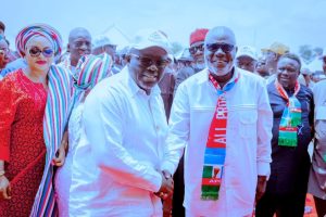 Newly elected state party chairman Chief Solomon Arenyeka being congratulated by Governor Sheriff Oborevwori on Tuesday