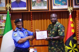 Inspector General of Police (IGP) Olatunji Rilwan Disu and Chief of Army Staff (COAS) Lieutenant General Waidi Shaibu