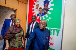 Abia Governor Alex Otti and LP IWC Chairman Nenadi Usman.