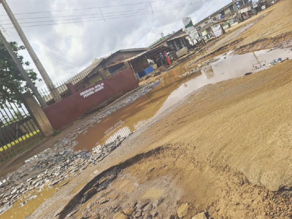 A portion of the damaged Mowo–Ikoga Zebbe–Ado Odo Road