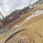 A portion of the damaged Mowo–Ikoga Zebbe–Ado Odo Road