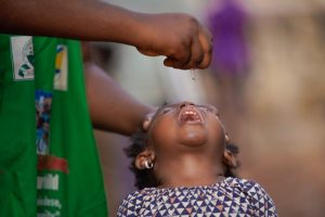 girls receiving vaccine shot