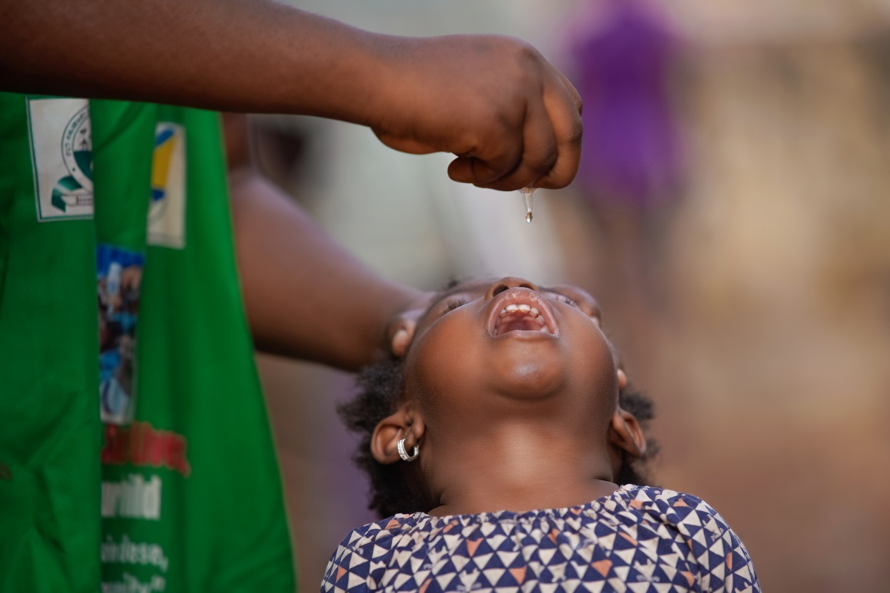 girls receiving vaccine shot