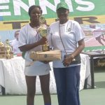 Girls U16s champion Gloria Samuel receiving her award from Mrs. Grace Otsemebor-Igbanoi, Head Event Management office.