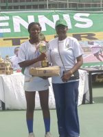 Girls U16s champion Gloria Samuel receiving her award from Mrs. Grace Otsemebor-Igbanoi, Head Event Management office.