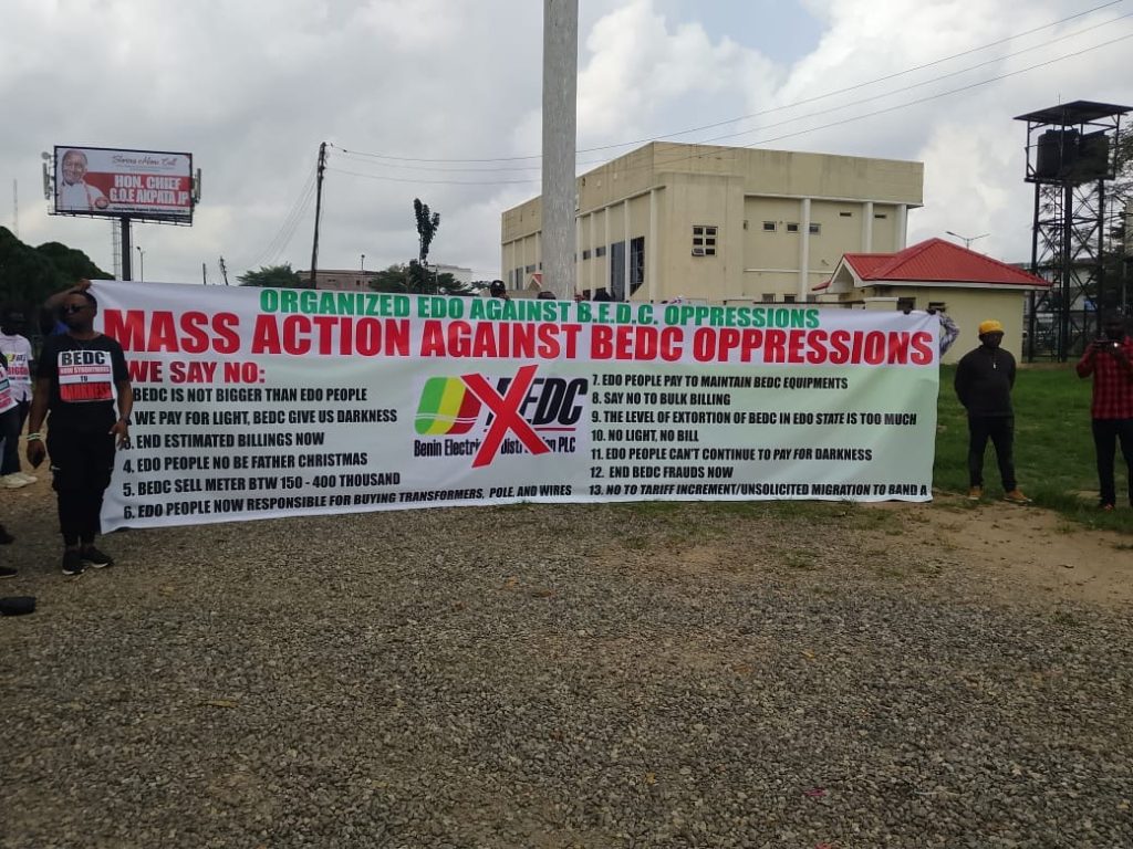 The protesters parading their banner at the Museum ground at the Ring Road, Benin City, Monday, March 2, 2026