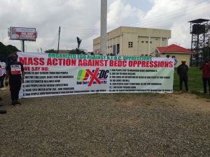 The protesters parading their banner at the Museum ground at the Ring Road, Benin City, Monday, March 2, 2026