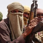Militants with rifles