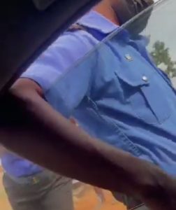 Policeman’s arm trapped in car window