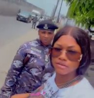 Police body search in FESTAC