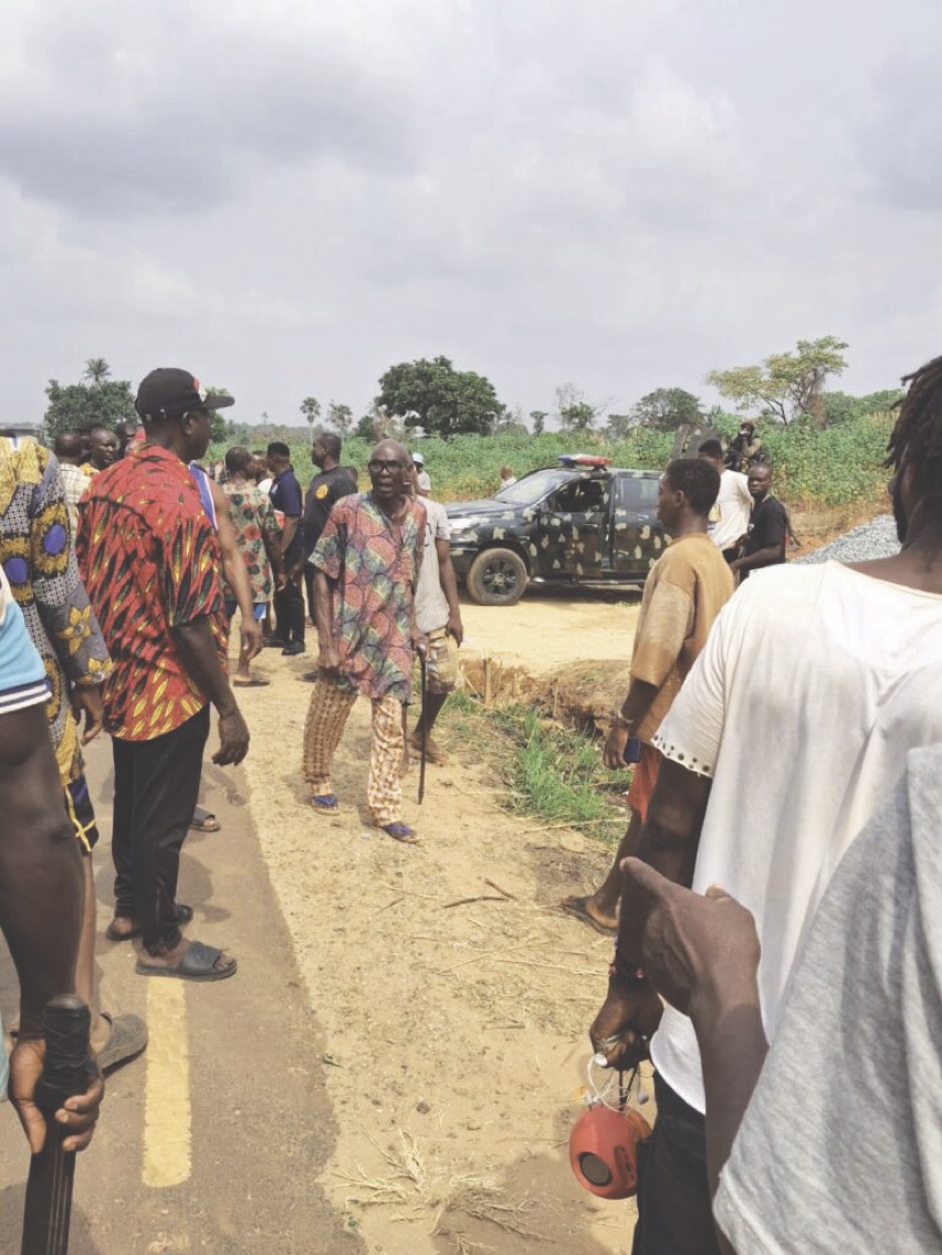 Urum villagers gathering in protest amid heavy presence of security agents