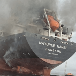 The Thailand-flagged cargo ship Mayuree Naree engulfed in black smoke in the Strait of Hormuz, March 11, 2026. ROYAL THAI NAVY/Handout via REUTERS