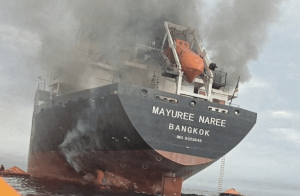 The Thailand-flagged cargo ship Mayuree Naree engulfed in black smoke in the Strait of Hormuz, March 11, 2026. ROYAL THAI NAVY/Handout via REUTERS