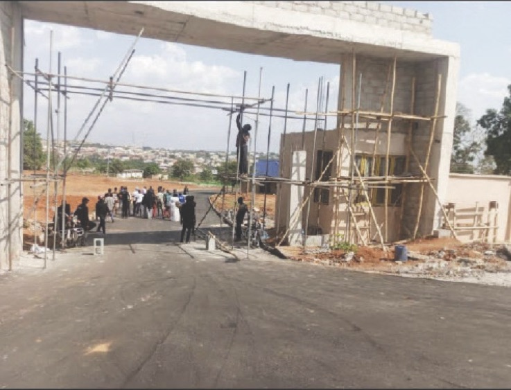 • Auchi College gate under construction.