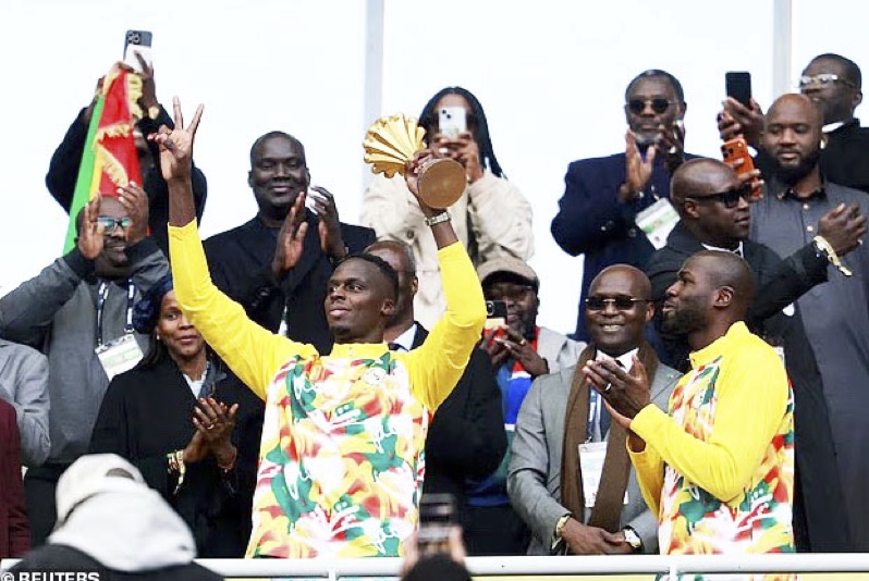 • Senegal led by Sadio Mane at the trophy parade in France yesterday.