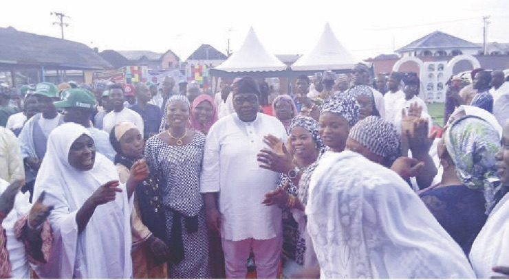 •Ereyitomi (middle) and women at the event.