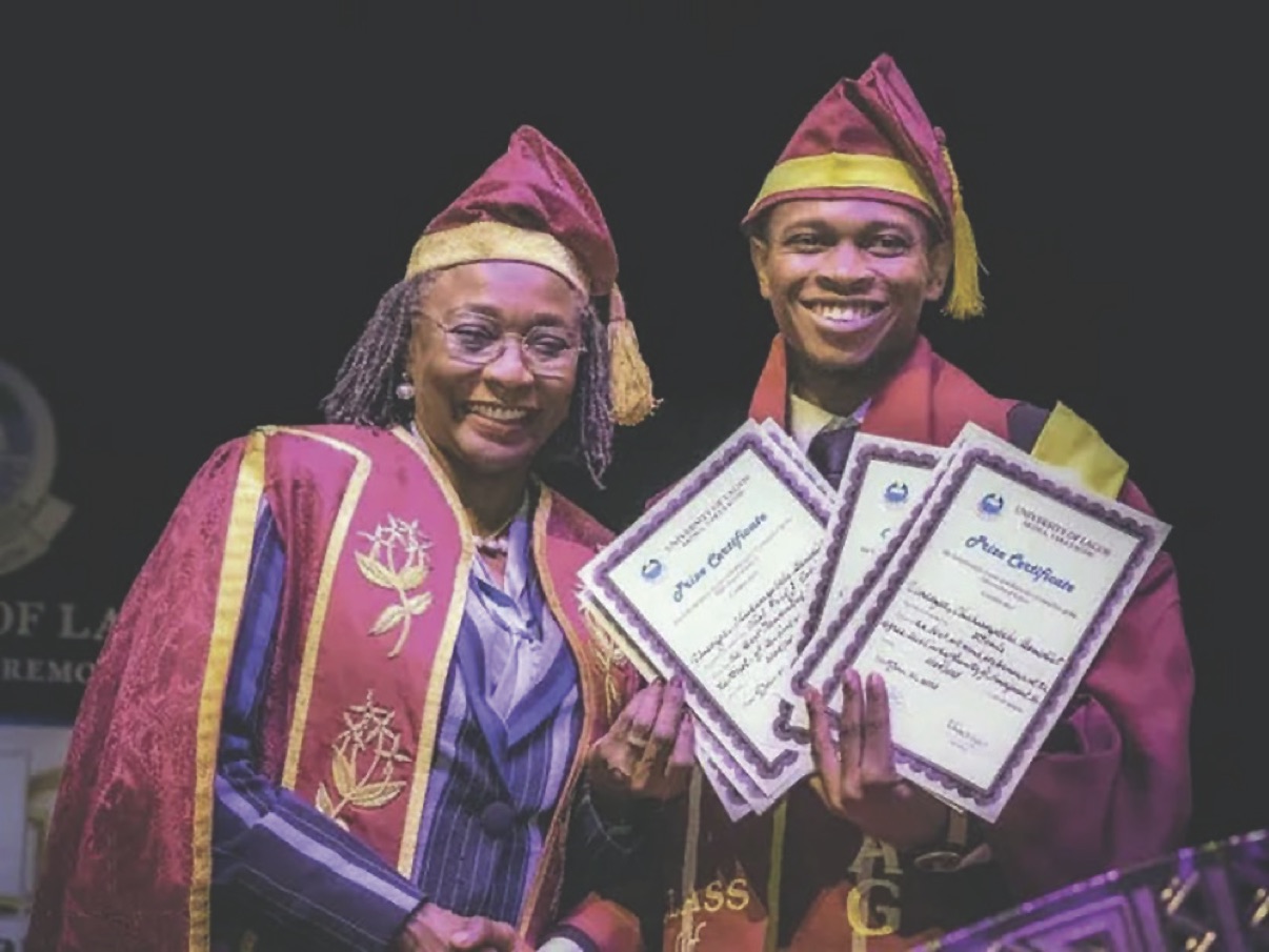 •Umeozor (right) displaying his awards with UNILAG VC, Prof. Folasade Ogunsola