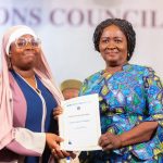 Ghanaian VP Prof. Opoku-Agyemang (right) present certificate to overall best student Huda Suleman (left)