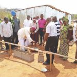 Archbishop Okeke laying the foundation stone