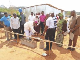 Archbishop Okeke laying the foundation stone
